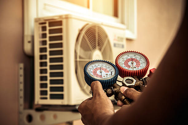 Professional Ac Installation technician working in Lake City, PA